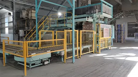 Máy bốc xếp bao xi măng lên pallet tự động