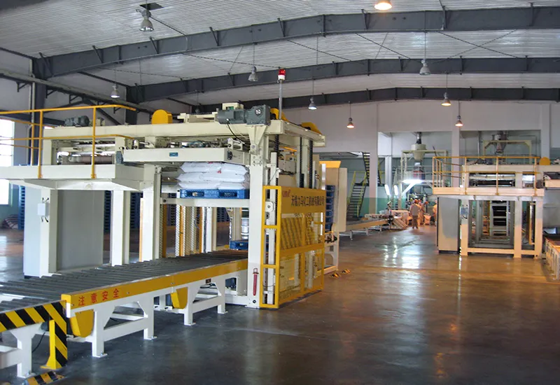 Dây chuyền cân, đóng bao, xếp pallet tự động lắp đặt tại nhà máy của khách hàng